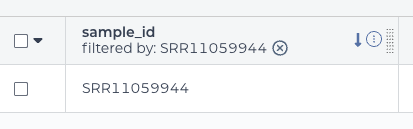 Screenshot of 'filtered by' breadcrumbs beneath the column header of a sample table with an x beside it to return to the main, unfiltered view