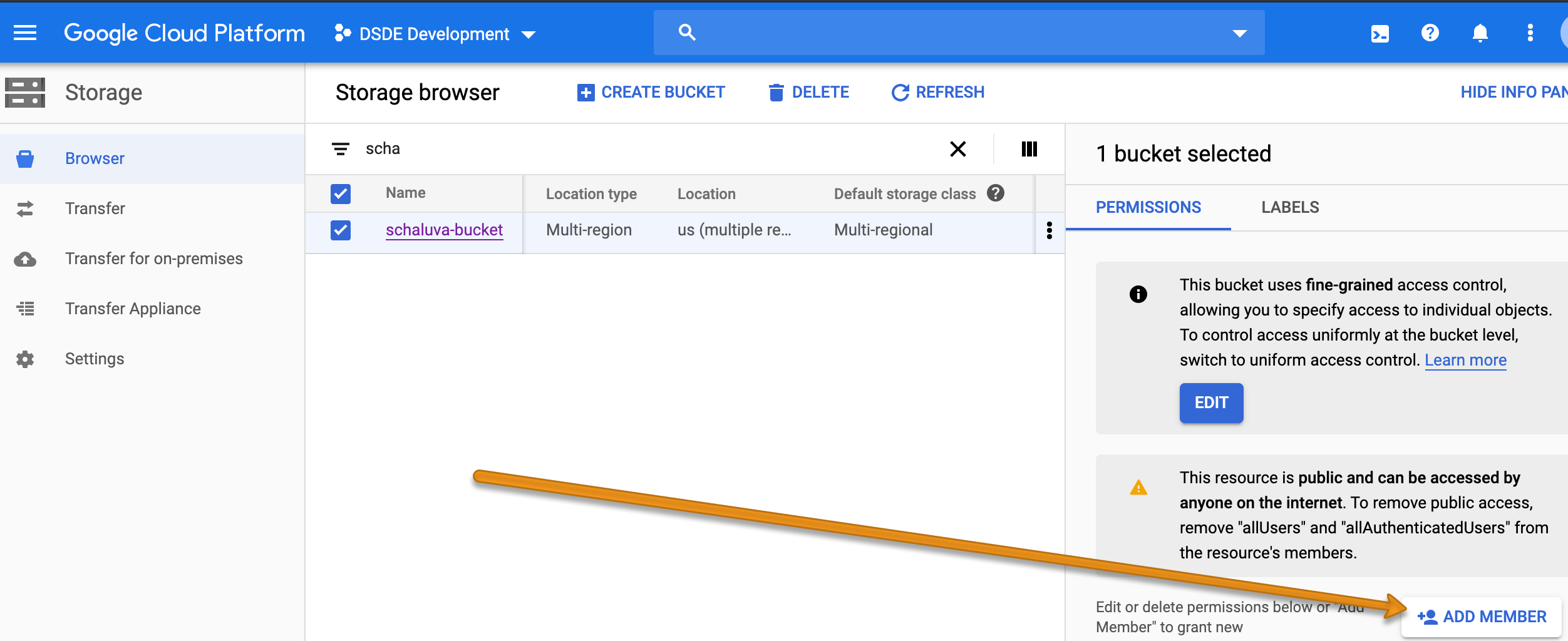 Screenshot of bucket in storage browser in GCP console with arrow pointing to the add members button at bottom right