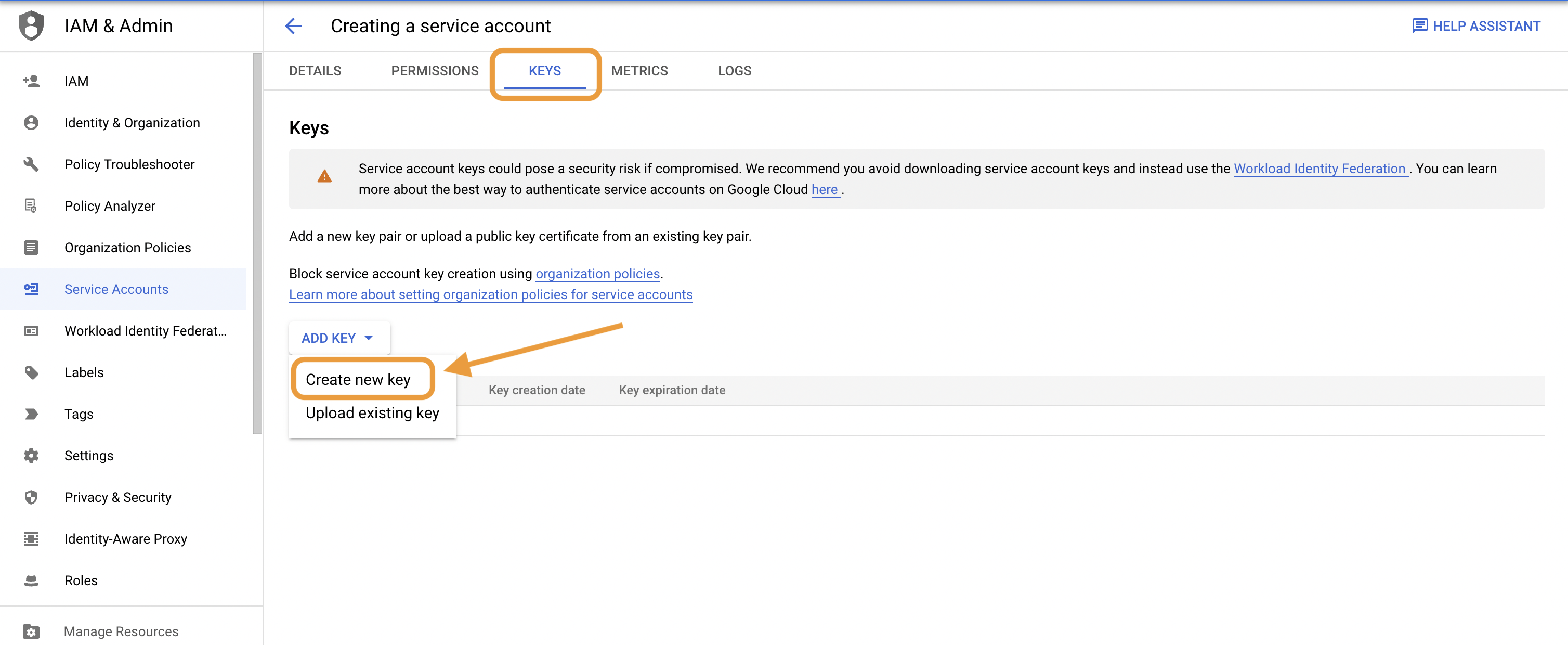 Screenshot of the keys tab in the create a service account step on GCP console with Create new key option circled under the add key tab.
